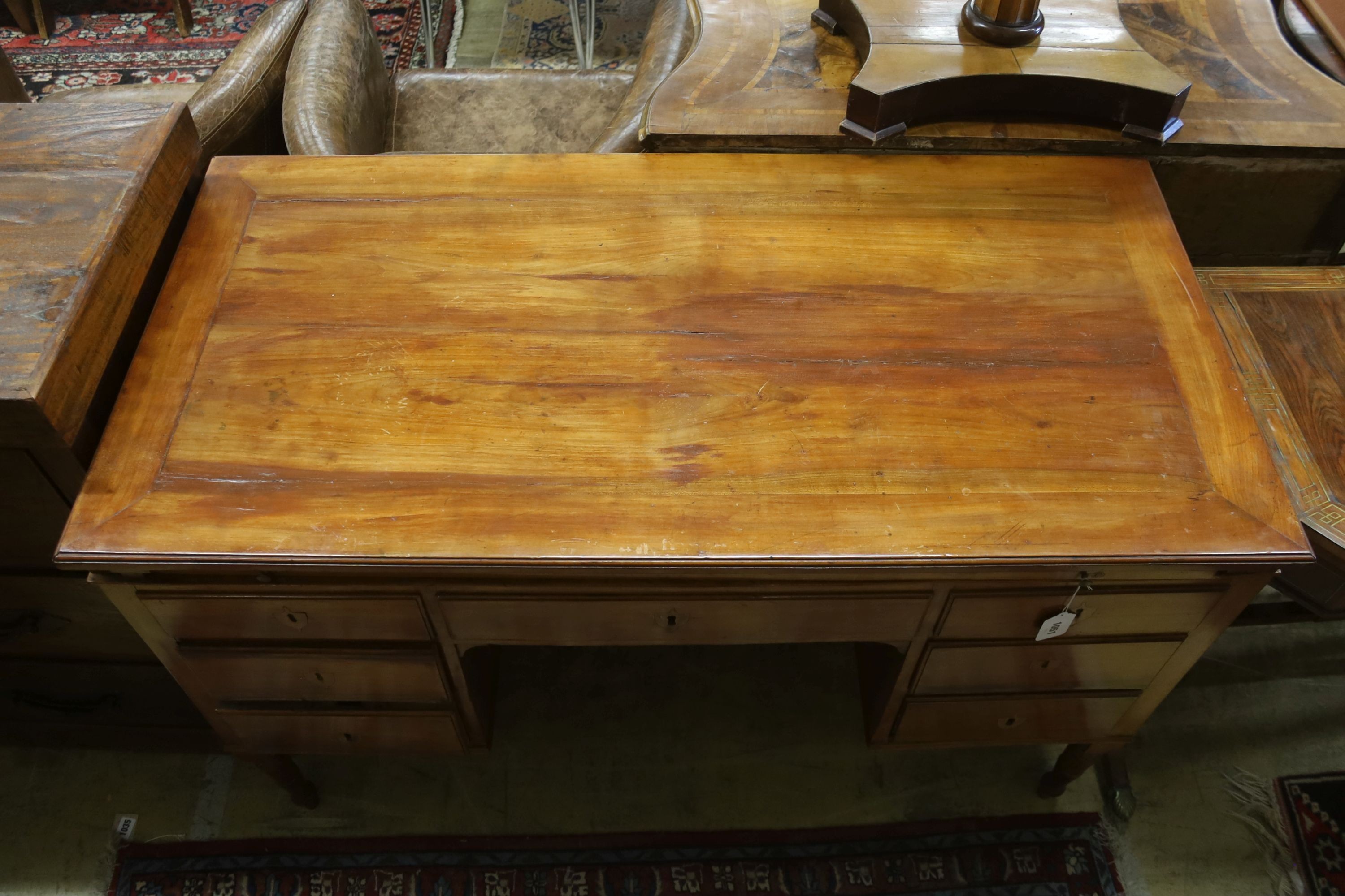 A late 19th/ early 20th century Italian walnut kneehole desk, width 122cm, depth 60cm, height 79cm